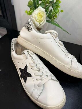 Women’s White Leather Sneakers with Black Star Detail